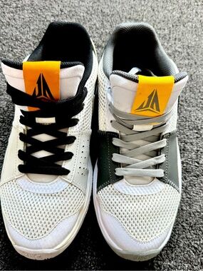 Nike Men's White Sneakers with Yellow Logo and Mixed Lace Colors